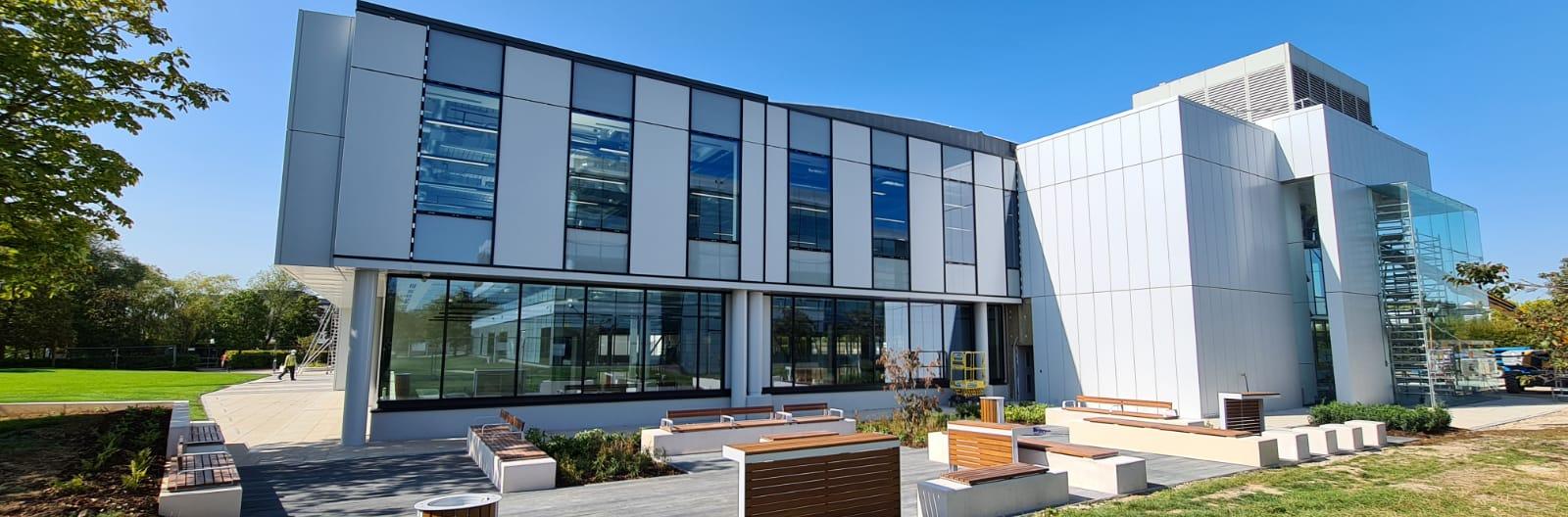 Completed glass and metal facade on a modern office building